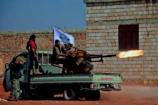 叙利亚，FSA武装使用一辆配备有ZPU-2的起亚小卡车，和IS武装交战中