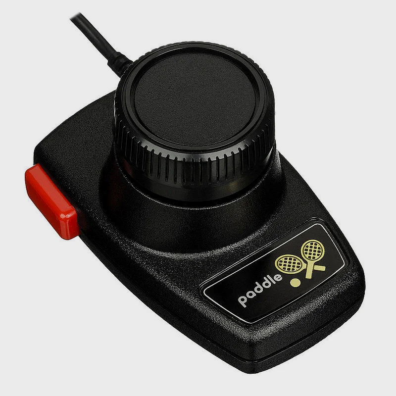 2600的板式控制器  有一个旋钮调整游戏中物体角度 红键同样为射击键
