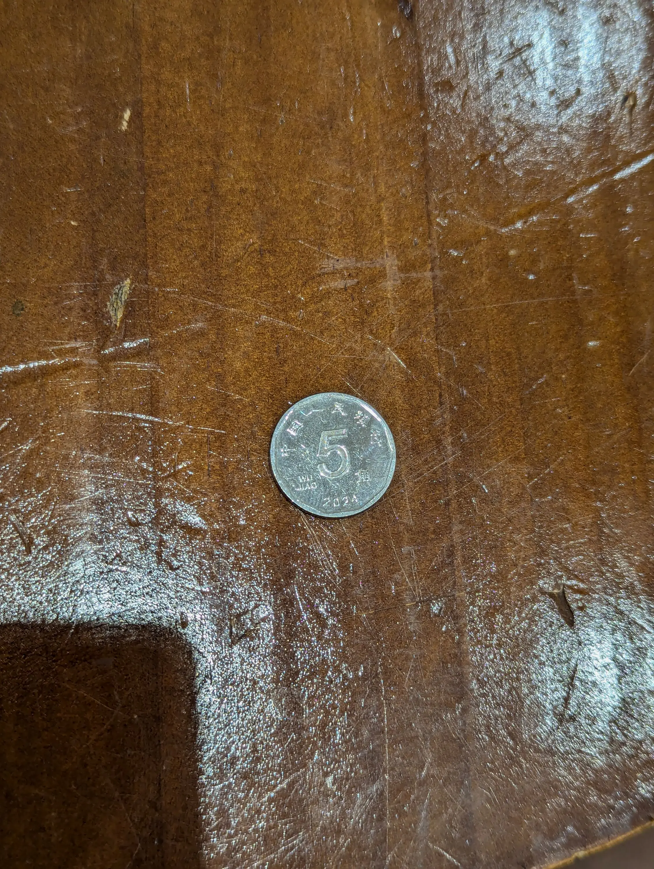 许久不用纸币硬币，这居然是新的五毛钱硬币。 | 机组| 机核GCORES