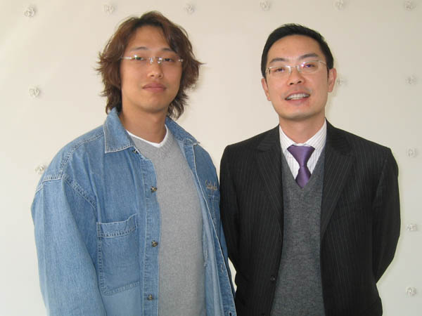 左：VANSOFT游戏策划总监权龙 右：奥美电子副总经理李志诚