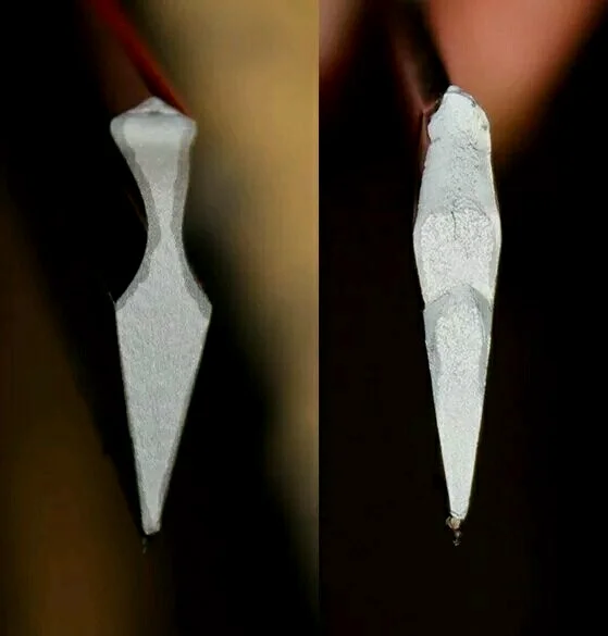 日本刀的断面，可以看到明显的包钢痕迹。