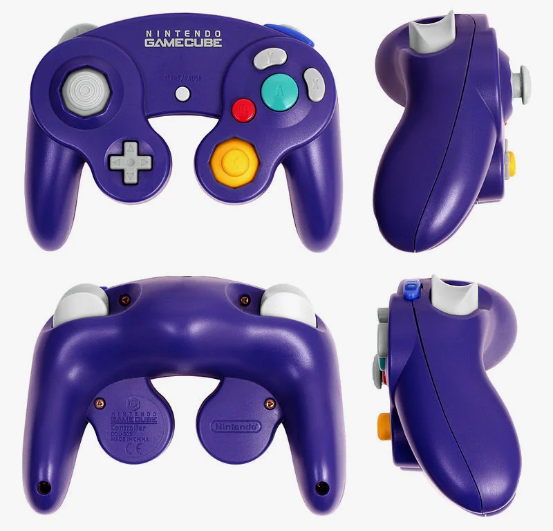 Gamecube的手柄将上一代N64的4个黄色C键换成了黄色类比摇杆 