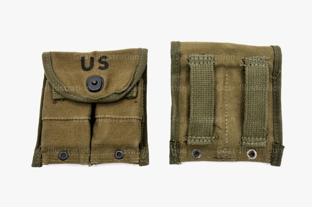 不仅是背包和腰带，部分附包也有双钩挂孔，用于加挂急救包，比如.30 M1 卡宾/步枪双联弹匣包