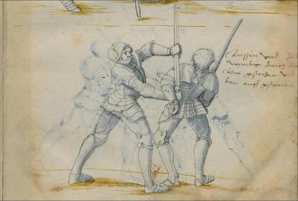 半剑往往会配合柔术与摔跤技术。图中的骑士就是通过反关节技控制住了对手，使其任人宰割。