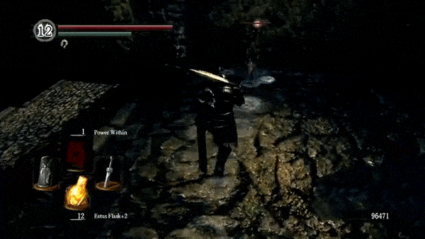 《黑魂1》利用暗处玩家会先注意到前方亮处敌人的心理，在暗处藏了2个车轮骷髅