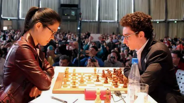法比亚诺对战侯逸凡。这个画面是我提到国际象棋经常第一个冒出来的画面